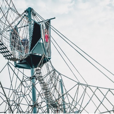 person in ship lookout tower with many cables