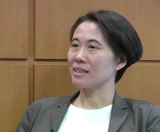 Lillian Siu sitting in an office