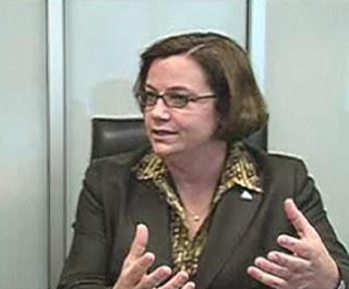 Susan Goodin sitting in an office