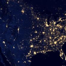 map of the USA showing lights in major cities during the night
